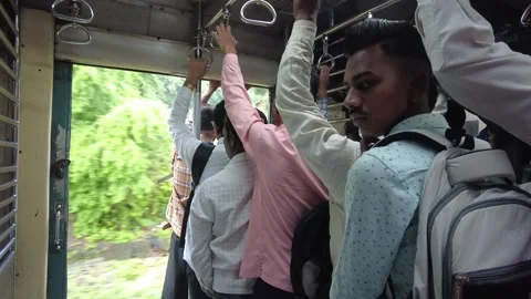 Over crowded Indian train during peak office hours. 4K (Real time) Stock Footage 253255496