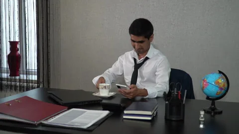 Over a cup of coffee after a hard day's work Stock Footage 245084880