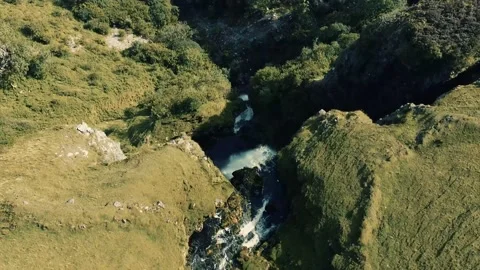 Over the edge of the Devil's Chimney Waterfall Stock Footage 236743737
