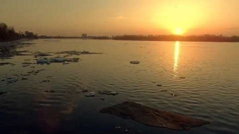 Over the evening an icy river Stock Footage 89615759