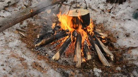 Over the fire in the winter a pan Stock Footage 88305964