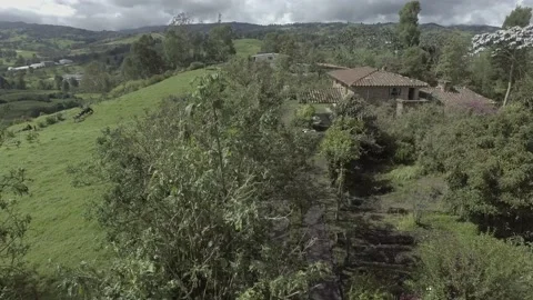 Over flying the house on the hill Stock Footage 219832728