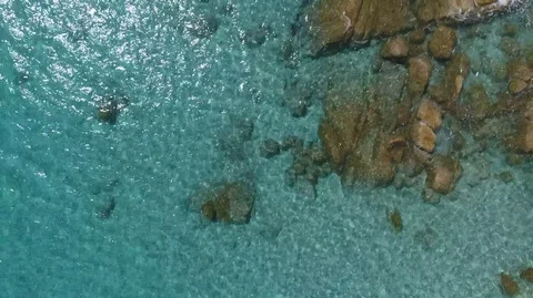 Over flying on surface translucent sea. Video stock 128801288