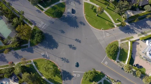 Over head drone shot of 6 point intersection in Beverly Hills California Stock Footage 128220550