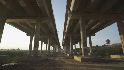 Over head footage The construction of a road bridge over the highway. Stock Footage 145982988