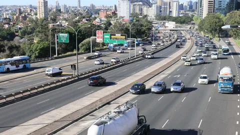 Over heavy traffic on multi-lane highway in North Sydney from Harbour bridge. Video stock 140105087