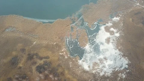 Over the icy lake through the clouds Video stock 116591853