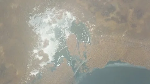 Over the icy lake through the clouds Stock Footage 116591859