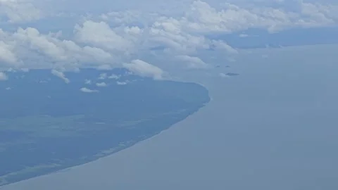 Over an island Stock Footage 322895079