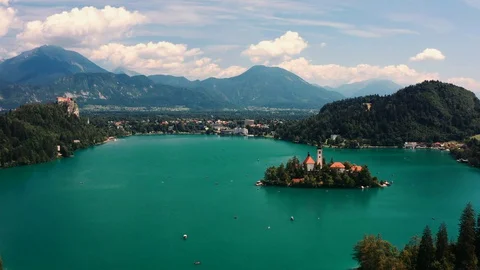 Over the lake Bled overlooking the island and mountains Stock Footage 128603121
