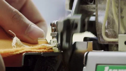 Over lock sewing machine. Sewing process. Needle. Close up  Video stock 209185835