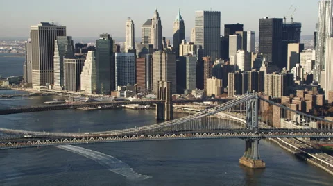 Over Manhattan Bridge, looking toward Brooklyn Bridge and New York Financial Stock Footage 59175942