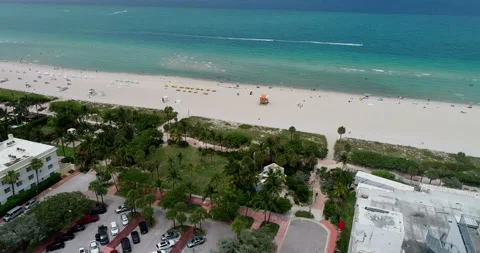 Over Miami Beach and old Faena tower Stock Footage 160374360