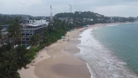 Over Mirissa beach 2 Video stock 327530032