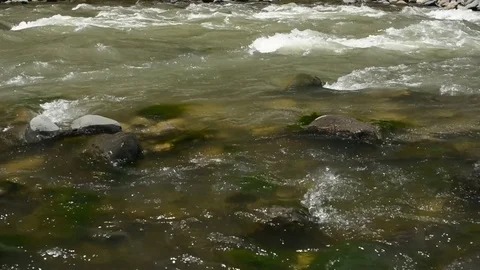 Over the mountain river 動画素材 77247627