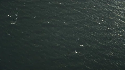 Over open ocean off the New Jersey coast at 1000 feet elevation. No horizon. Stock Footage 59219344