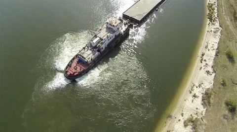  Up over river tow pushing barge.  Aerial top view Видео 47464752