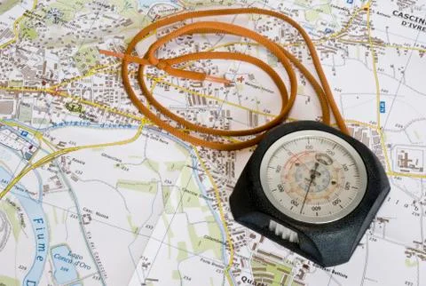 Over the road map is positioned the altimeter. Stock Photos