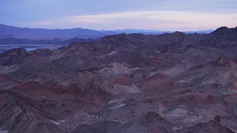 Over Rocky Terrain Stock Footage 77854614