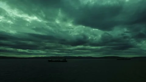 Over the sea with the ships clouds float. Stock Footage 142934616