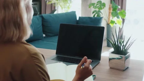 Over the shoulder distant student blonde girl learning new language educational Video stock 143593067