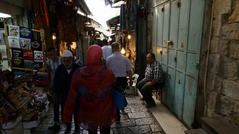 Over Shoulder Lady Walks Along The Streets Of Jerusalem Stock Footage 90590160