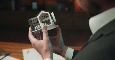 Over the shoulder shot of an architect working on a building layout. Stock Footage 242178168