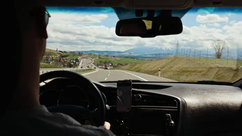 Over shoulder shot: driving sequence capturing driver navigating highway Vídeo Stock 311542958