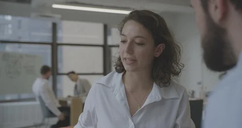 Over the shoulder shot of female explaining business Stock Footage 93213900