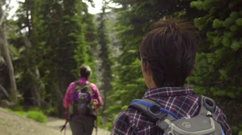 Over the shoulder shot of two women hiking Stock Footage 59082711