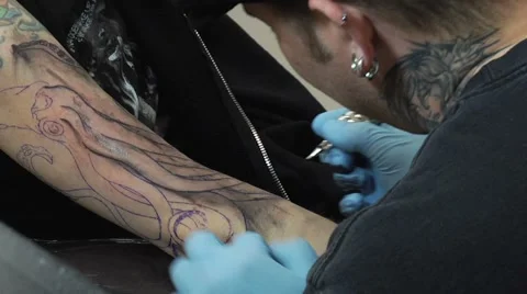 Over the shoulder tattoo Stock Footage 5299246