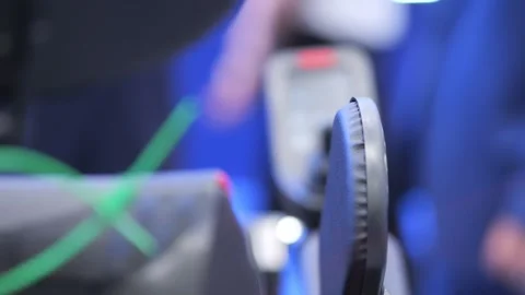 Over-the-shoulder view of gamer using controller Stock Footage 346149455