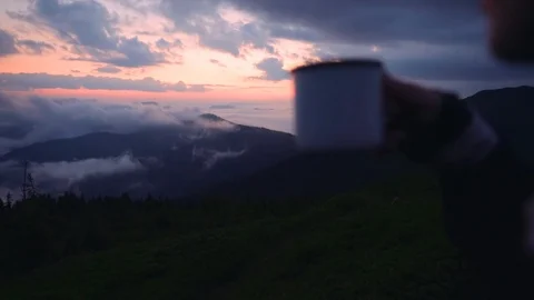 Over the shoulder view inspired young woman enjoying summer landscape at sunset Stock Footage 114318599