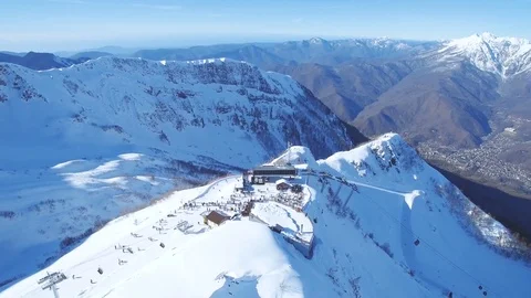 Over  top of mountain with  ski station aerial view 스톡 동영상 84907363