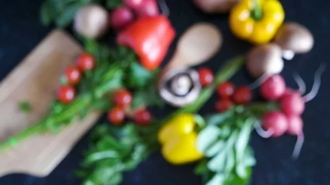 Over top view crane shot on radish, yellow and red pepper, mushrooms and cherry Stock Footage 82760015