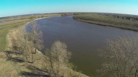 Over trees and river. Spring Landscape. Aerial Stock Footage 37116329