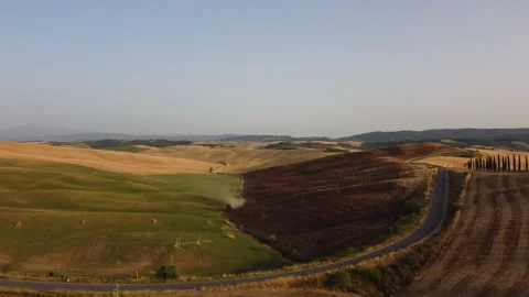 Over the tuscan fields with sunlight and shadows Stock Footage 319484480