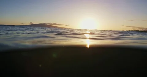 Over Underwater View of Sunset Light Rays Stock Footage 76284134