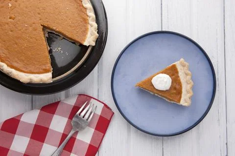 Over view of a plate of pumpkin pie. Stock Photos