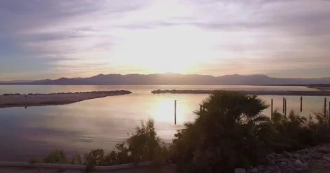 Over Water Towards Sunset Stock Footage 60658099