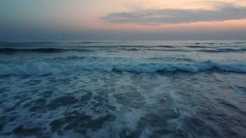 Over the waves at Sunset Video stock 151416926