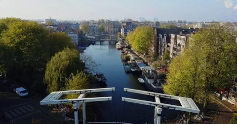 Over the white counterweights of a canal drawbridge Vídeos de archivo 71295269
