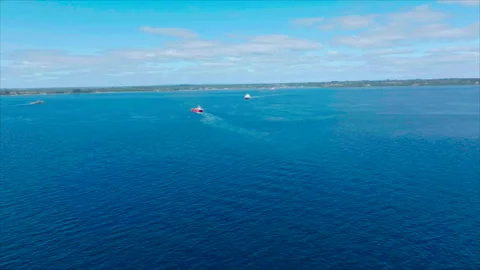 Overall view of blue ocean with boats and coast Vídeo Stock 340992516
