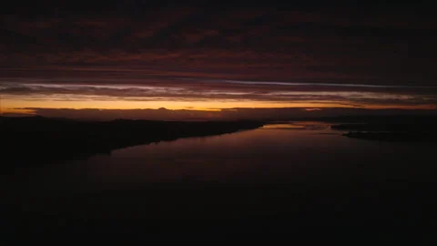 Overall view of ocean and hills of Puerto Montt at sunset Stockbeeldmateriaal 340993400