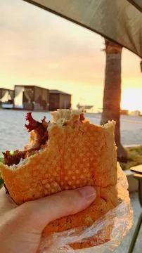 Overbite sandwich with a view of the beach Stock Photos