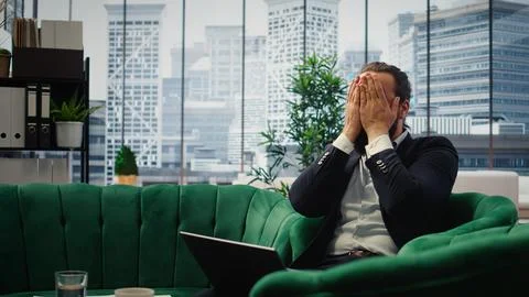 Overburdened director dealing with workload and financial instability Stock Photos