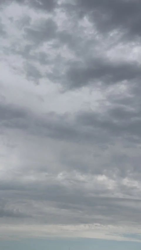 Overcast cloud time lapse with dramatic gray sky and weather change Stock Footage 339500984