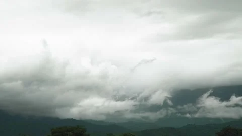 Overcast Cloudy floating low hidden mountain and sky before the rain coming Stock Footage 198799448