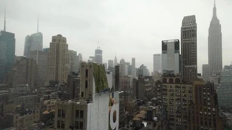 Overcast cold winter day snow showers Midtown Manhattan New York City Stock Footage
