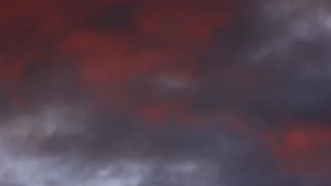 Overcast evening sky with moving clouds reflecting orange sunset, 4K Video stock 161637078